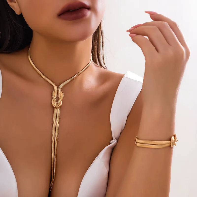 Set Gioielli Dorati Infinity - Collana e Bracciale
